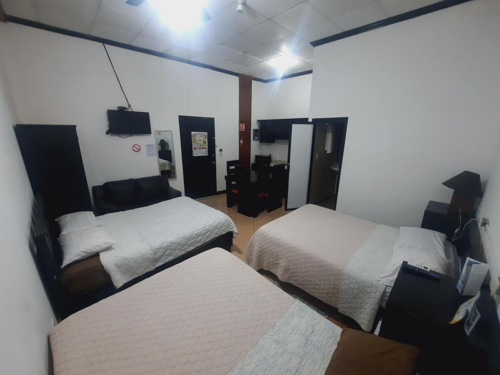 Hotel Garcias Suites, Linares Номер фото