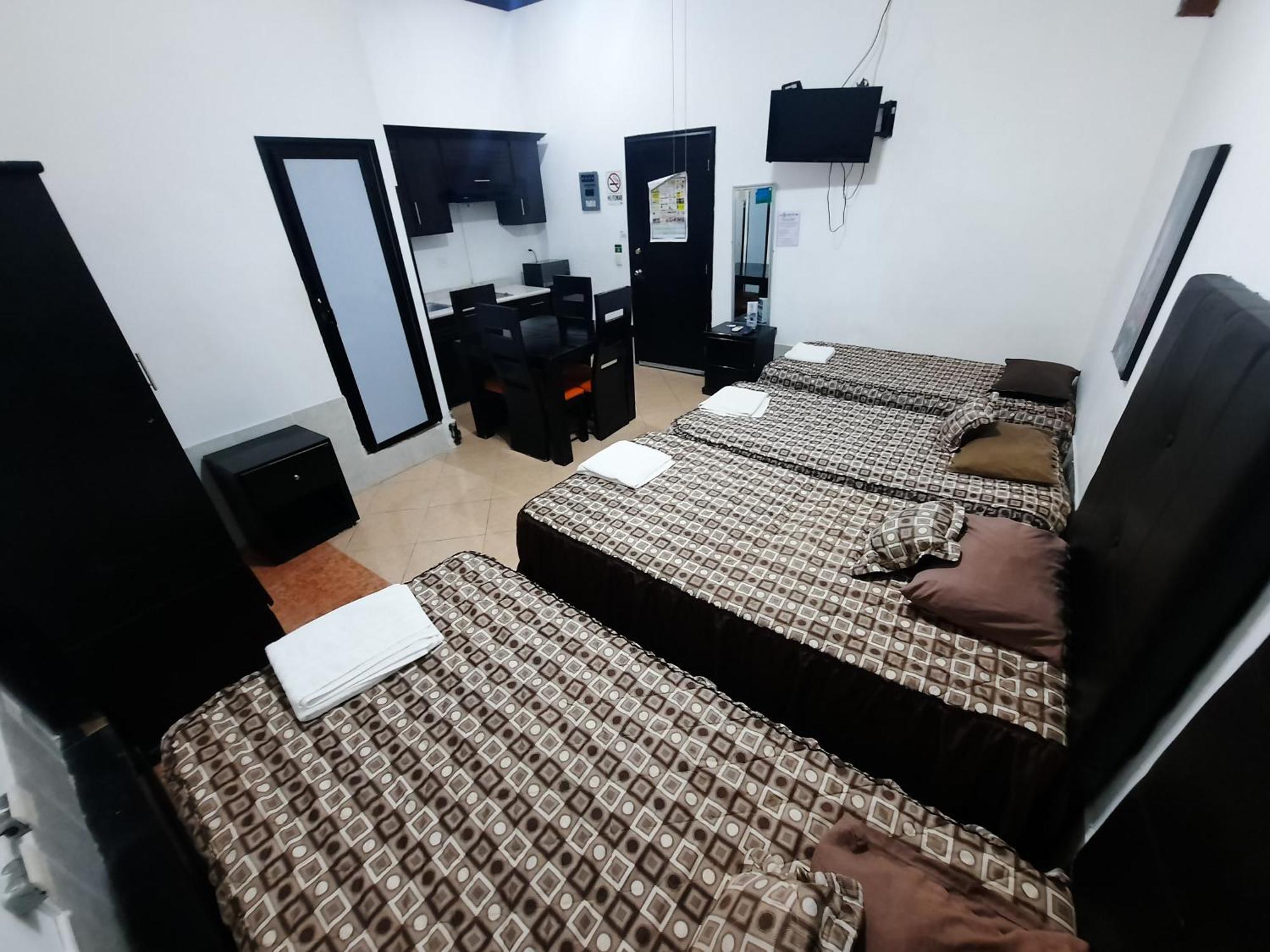 Hotel Garcias Suites, Linares Номер фото